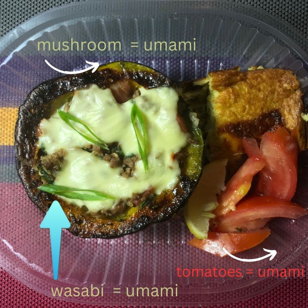 Living well in the 21st century - Limassol, Cyprus - picture of a clear plate with three items. Each one representing umami flavor. First one, mushroom, wasabi, and tomatoes. Also, on the dish there is one slice of lemon, and a slice of bread. 